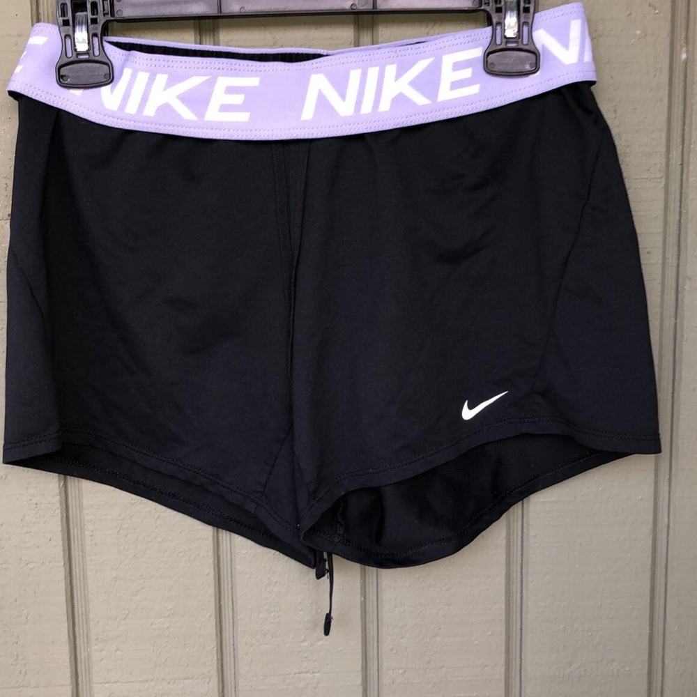 Black/ purple Nike shorts! In perfect condition, size small!!!:)